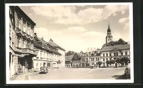 AK Chribska, Blick vom Hauptplatz zum Kirchturm