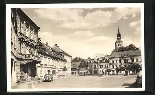 AK Chribská, Marktplatz mit Kirche