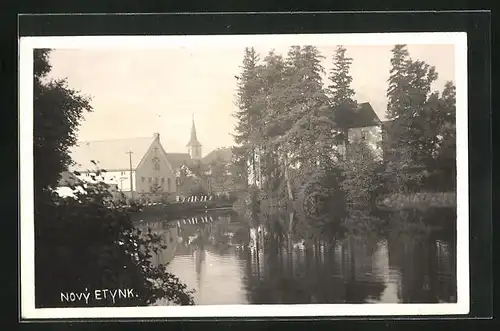 AK Novy Etynk, Flusspartie mit Kirche