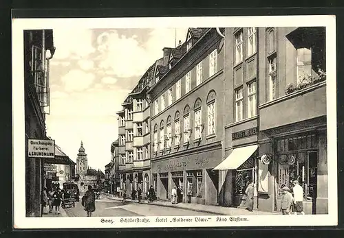 AK Saaz, Schillerstrasse mit Hotel Goldener Löwe und Kino Elysium