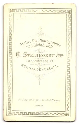 Fotografie H. Steinhorst jun., Neuhaldensleben, Langestrasse 50, Kleiner Junge mit Geschwisterkind in modischer Kleidung