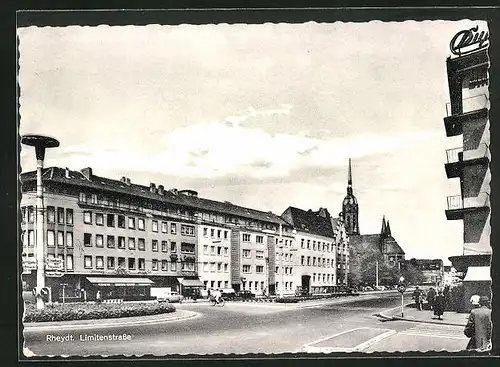 AK Rheydt, Limitenstrasse mit Geschäften und Kirche