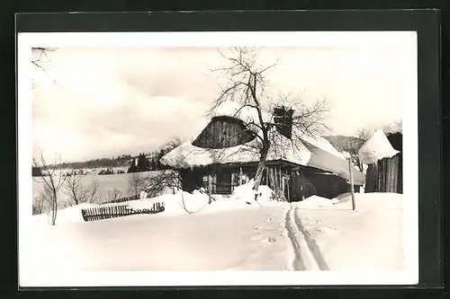 AK Horni Becva, Holzhaus im Schnee