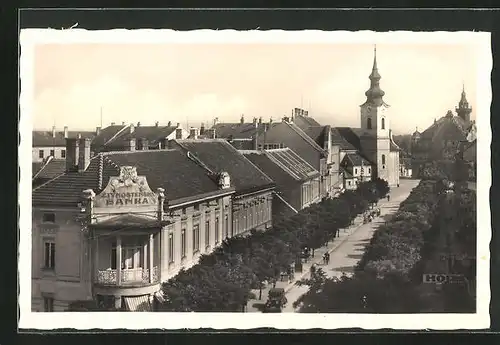 AK Göding / Hodonin, Strassenpartie mit Kirche