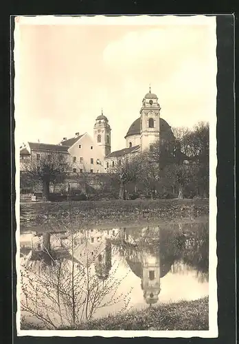 AK Jaromerice n. Rok., Blick über den Fluss zur Kirche