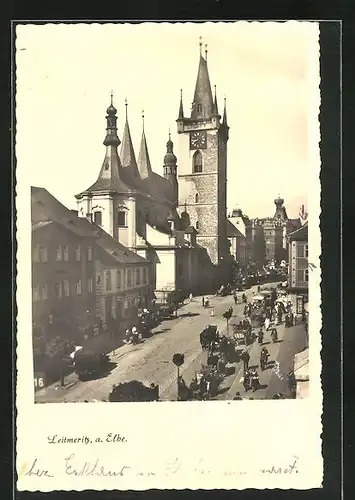 AK Leitmeritz / Litomerice, Strassenpartie mit Kirche