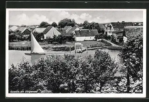 AK Gussow / Dolgensee, Teilansicht mit Gasthaus M. Paschke