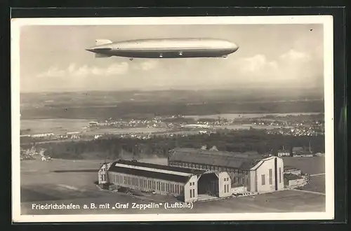 AK Friedrichshafen a. B., Zeppelin  Graf Zeppelin  LZ 127 über der Zeppelinhalle