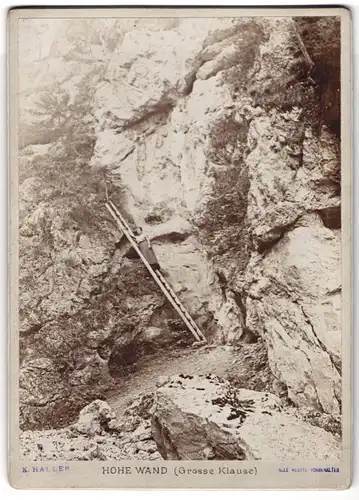 Fotografie K. Haller, Ansicht Maiersdorf, Hohe Wand mit Grosse Klause, Frau steht auf einer Leiter zum Grössenvergleich