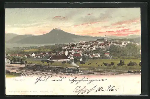 AK Hechingen, Ortsansicht mit Eisenbahn im Abendlicht