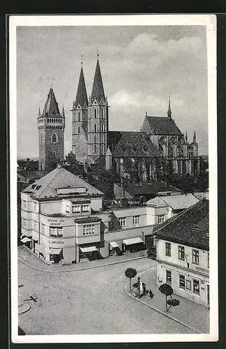 AK Kolin, Strassenpartie mit Blick zur Kirche
