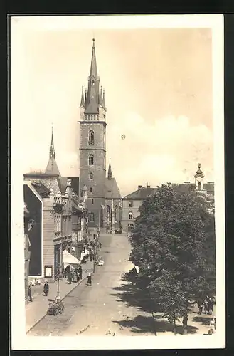 AK Tschaslau / Caslav, Strassenpartie mit Kirchblick