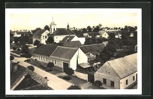 AK Sezimovo usti, Blick über die Dächer der Stadt zur Kirche