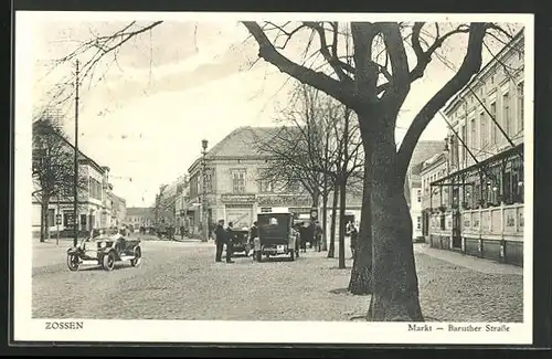 AK Zossen, Markt und Baruther Strasse mit Geschäften