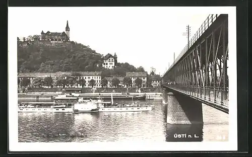 AK Aussig / Usti, Partie an der Brücke mit Dampfer