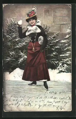 AK Fräulein auf Schlittschuhen mit einem Schneeball