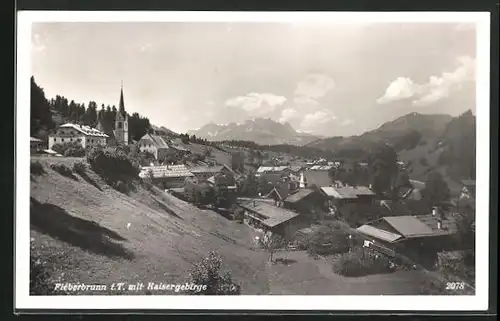 AK Fieberbrunn, Ortsansicht mit Kaisergebirge