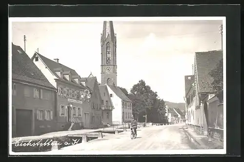 AK Eichstetten a. K., Strassenpartie mit Gasthaus zum Rössle-Post, Kirche und Radfahrer