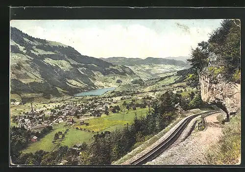 AK Lungern, Brünigbahn mit Blick zum Ort