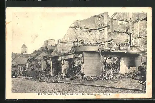 AK Ortelsburg, verwüsteter Markt mit Kirche in der Ferne