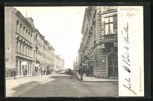 AK Eger, Bahnhofstrasse mit Geschäften