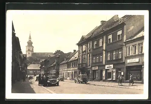 AK Mimon, Strassenansicht mit Geschäften