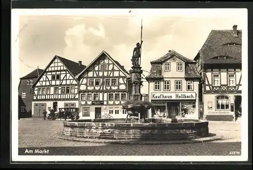 AK Vacha /Rhön, Am Marktbrunnen, Kaufhaus Hellbach, Gasthaus und Fleischerei