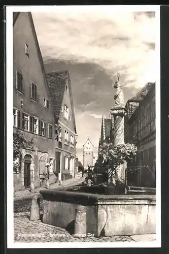 AK Mainbernheim, Brunnen und unteres Tor mit Metzgerei
