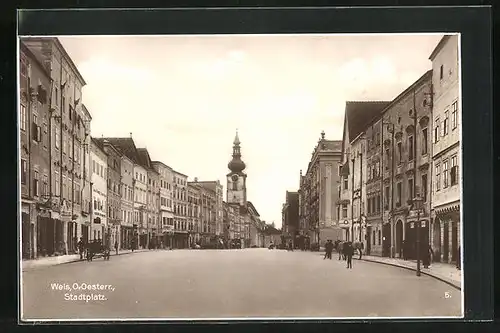 AK Wels, Stadtplatz mit Geschäften und Kirche