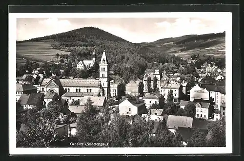 AK Graslitz /Sudetengau, Teilansicht mit Kirche und Modehaus Josef Korb