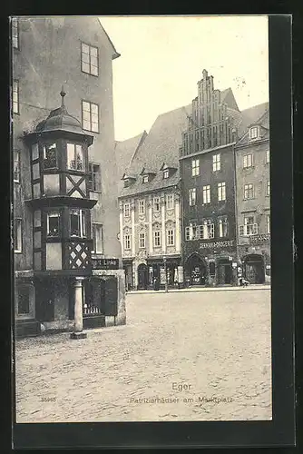 AK Eger, Patrizierhäuser am Marktplatz mit Germania Drogerie