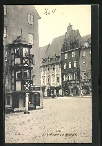 AK Eger, Patrizierhäuser am Marktplatz, Germania Drogerie