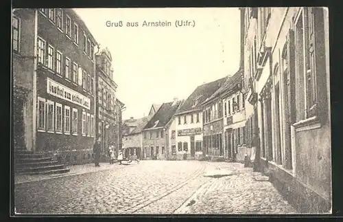 AK Arnstein / Ufr., Strassenpartie mit Gasthof zum goldenen Lamm