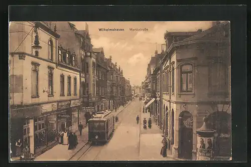 AK Wilhelmshaven, Marktstrasse mit Gasthaus Bierklause und Geschäften, Strassenbahn