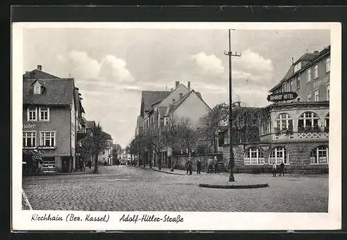 AK Kirchhain /Bez. Kassel, Strasse mit Bahnhof Hotel