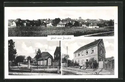 AK Jaucha, Bäckerei und Materialwarengeschäft, Partie am Denkmal 1870-71, Teilansicht