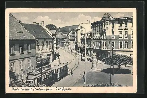 AK Oberleutensdorf / Litvinov, Strassenpartie an der Schlossgasse mit Strassenbahn