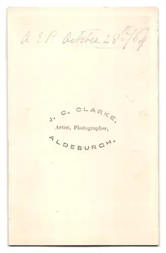 Fotografie J. C. Clarke, Aldeburgh, Portrait Dame im weissen Kleid mit Zöpfen, 1864