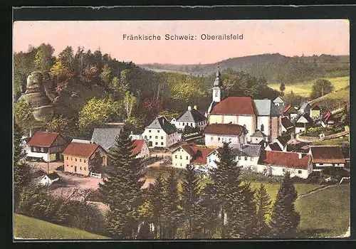 AK Oberailsfeld, Ortsansicht mit Kirche im Abendlicht