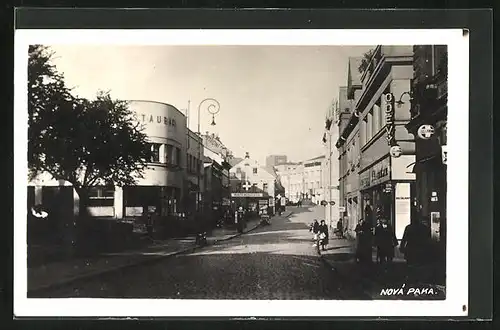 AK Nova Paka, Strassenpartie mit Geschäften