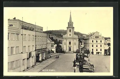 AK Nova Paka, Strassenpartie mit Kriche