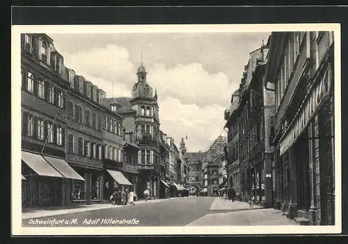 AK Schweinfurt a. M., strasse mit Geschäften