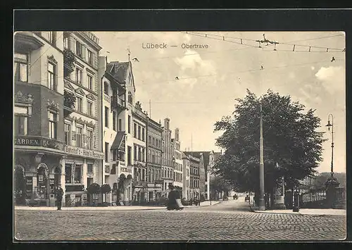 AK Lübeck, Strasse an der Obertrave mit Bahnhof`s-Hotel Restaurant