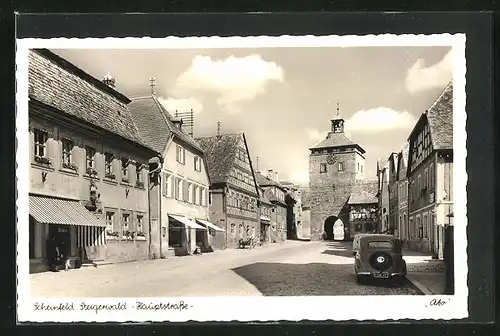 AK Scheinfeld, Blick in die Steigerwald-Haupstrasse mit Torbogen