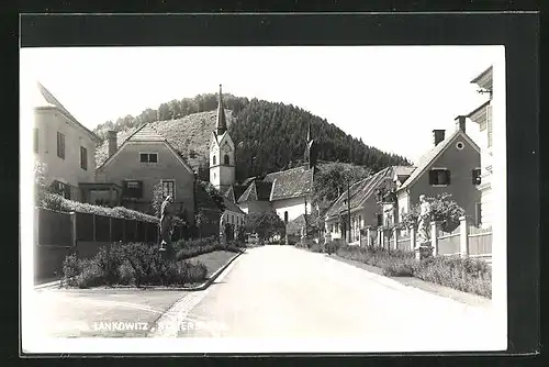 AK Maria Lankowitz, Strassenpartie mit Blick zur Kirche