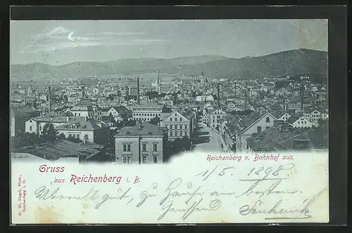 Mondschein-AK Reichenberg / Liberec, Totalansicht vom Bahnhof aus