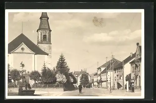 AK Stühlingen, Strassenpartie mit Kirche