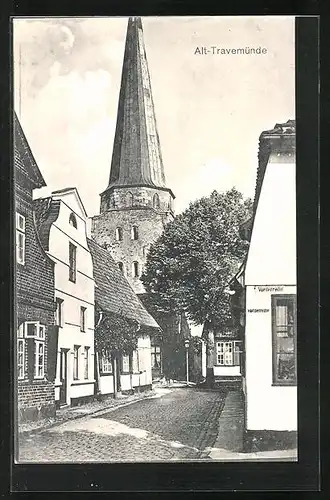 AK Travemünde, Blick in eine kleine Gasse mit Kirche am Ende