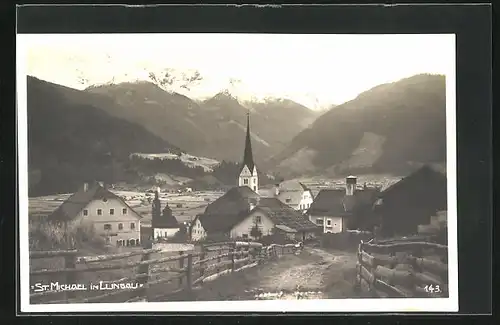 AK St. Michael /Lungaum, Ortspartie mit Kirche