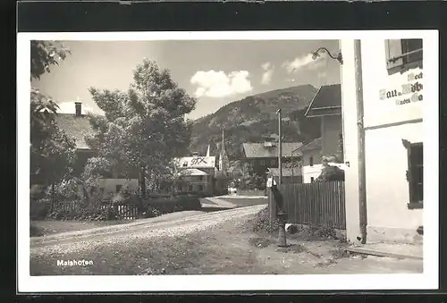 AK Maishofen, Strassenpartie mit Blick zur Kirche